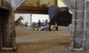 As the civilians hunker down, two officers stand guard