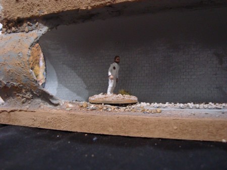 I got to play on the table, here's my astronaut almost making it out through a storm drain before being captured by damn dirty apes