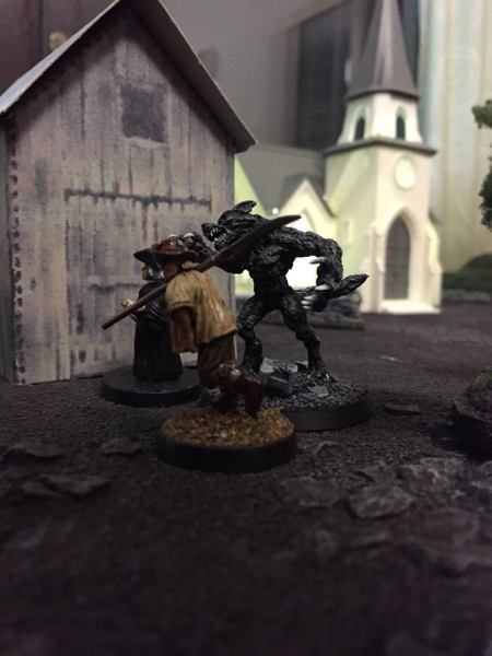 The werewolf goes after the priest and a villager