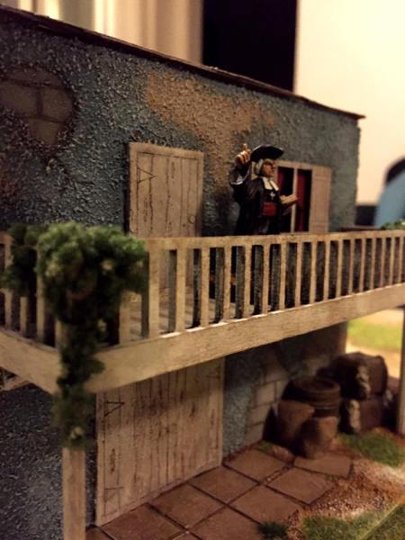 The outraged reverend watches as the chaos of the pirate attack unfolds