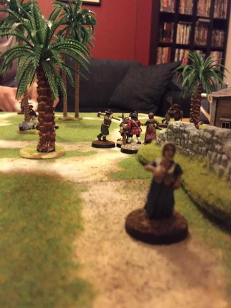 Townsfolk team up with a redcoat to take a pirate down while a villager flees