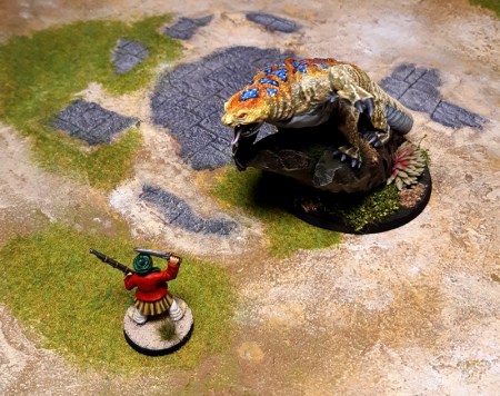Scene of lizard threatening pirate miniature